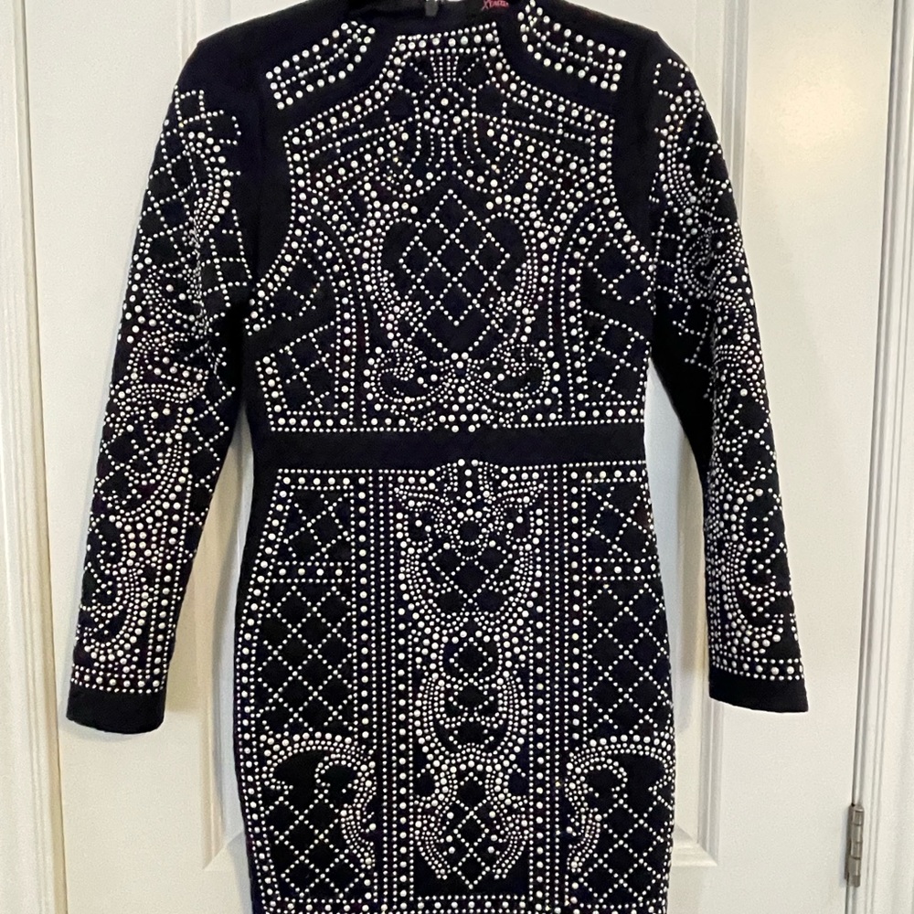 Stylish and sexy, fitted, beaded dress quilted fabric with some stretch